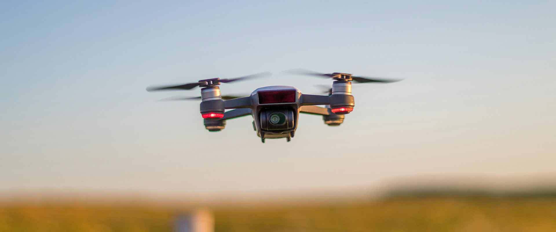 A drone is flying over a field.